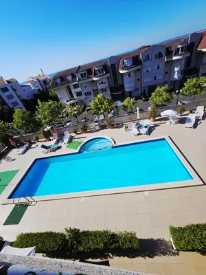 an overhead view of a swimming pool in a building at Апартамент Кара миа in Sveti Vlas
