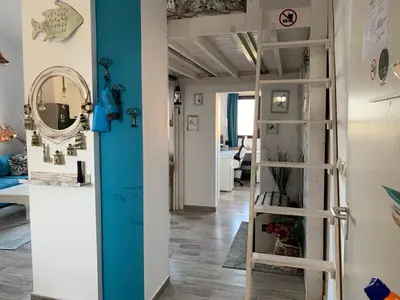 a room with a bunk bed in a room with a hallway at Seaview Young Family - Семейство на Черно море in Aheloy