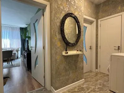 a bathroom with a mirror on the wall at The Master and Margarita Centre in Burgas City