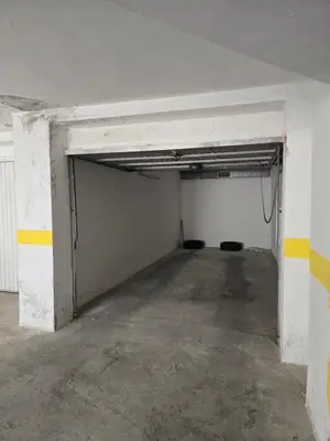 an empty room with a garage in a building at Izabela in Pomorie