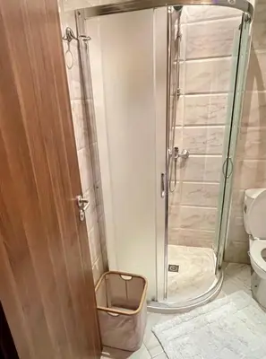 a shower with a glass door in a bathroom at Cozy apartment on Sunny Beach in Sunny Beach