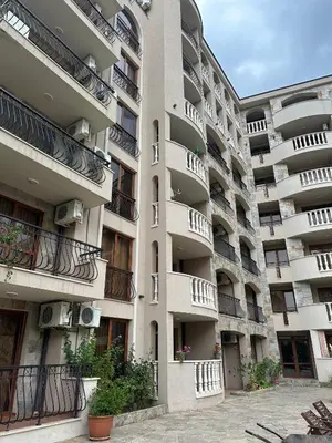 an apartment building with balconies on the side of it at Kalia A7 Sunny Beach in Bŭnzareto