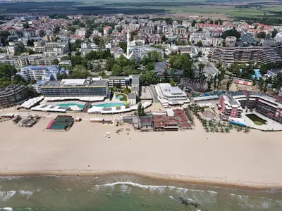 an aerial view of a beach and buildings at Apartment D9 Yassen HV in Sunny Beach