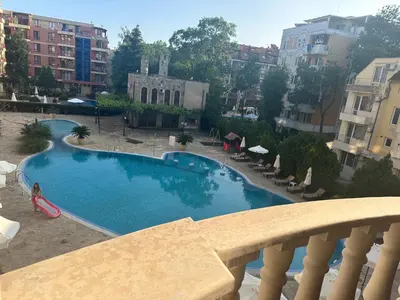 a view of a swimming pool from a balcony at Kalia A7 Sunny Beach in Sunny Beach
