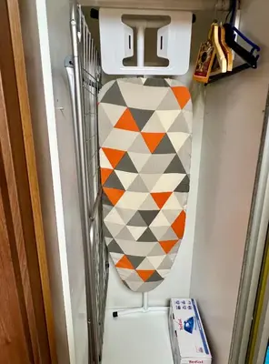 a vase in a refrigerator with a geometric pattern at Urban Nest Varna - Near Center and Bus Station in Varna City