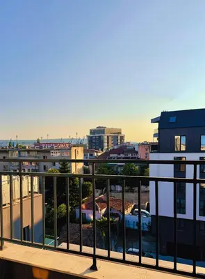 a view of a city from a balcony at Harbour Top-View Terrace 2-BDR Central Apartment in Varna City