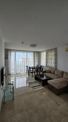 a living room with a couch and a table at PSB Apartments in Etara 2 & 3 Complex Sveti Vlas in Sveti Vlas