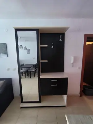a room with a mirror and a dining room at PSB Apartments in Etara 2 & 3 Complex Sveti Vlas in Sveti Vlas