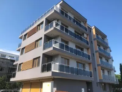 an apartment building with blue balconies on it at Blue Magenta 1 in Sozopol