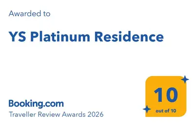 a yellow sign that reads x platinum resistance at YS Platinum Residence in Sunny Beach
