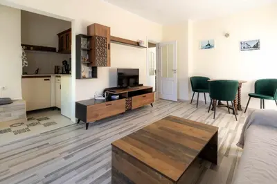 a living room with a couch and a table at Mila 6 in Burgas City