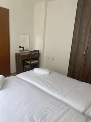 a bedroom with a white bed and a desk at Family, Friendly 2 Bed Apartment in Sunny Beach