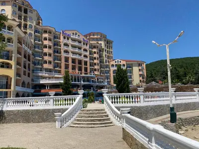 a city with stairs and buildings in the background at ANDALUSIA BEACH A602 Elenite in Burgas City