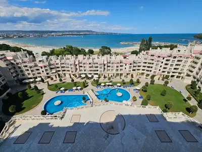 an aerial view of a resort with two swimming pools at Comfy Flat Sea View & Strong Wi-Fi in Varna City