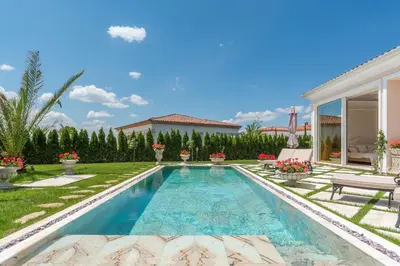 a swimming pool in the backyard of a house at Villa Dolce Vita in Sunny Beach