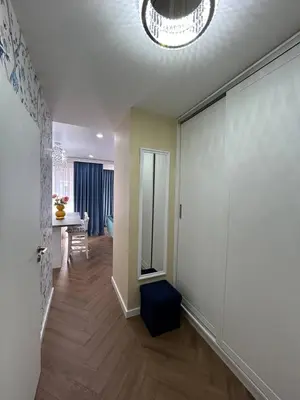 a living room with a hallway with a sliding glass door at Bayview Family 2 in Burgas City