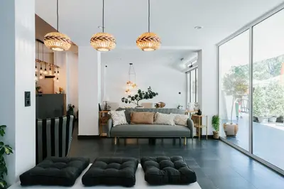 a living room with a couch and a table at Hotel Sozopol 99 in Sozopol