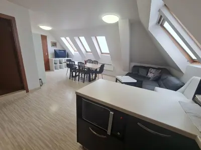 a living room with a couch and a table at 