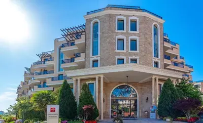 a large building with stairs on top of it at Millenium II B34 in Sveti Vlas