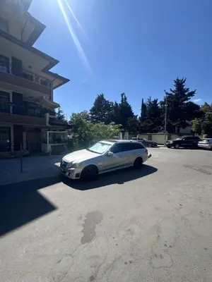 a car parked in a parking lot next to a building at Villa Tanita in Ravda
