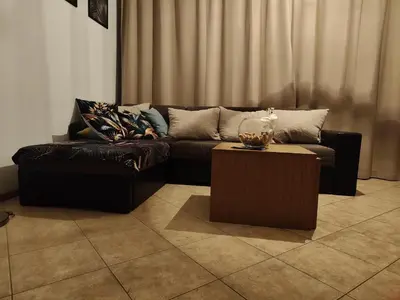 a living room with a couch and a coffee table at Grand Kamelia C1 in Sunny Beach