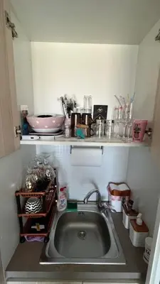 a small kitchen with a sink and a shelf at PARADISO B 410 Studio with SEA VIEW in Nesebar
