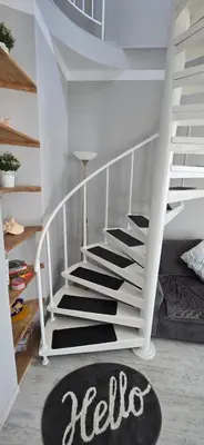 a white staircase with a black rug in a room at New 3Room Maisonette Apartment in Sunny Day 3 Sunny Beach in Sunny Beach