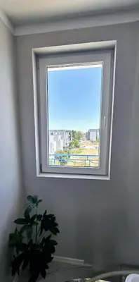 a window in a room with a potted plant at New 3Room Maisonette Apartment in Sunny Day 3 Sunny Beach in Sunny Beach