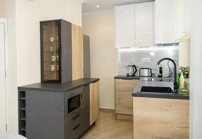 a kitchen with a sink and a counter at Stylish Apartment - the Heart of Central Varna by Flat Manаger in Varna City