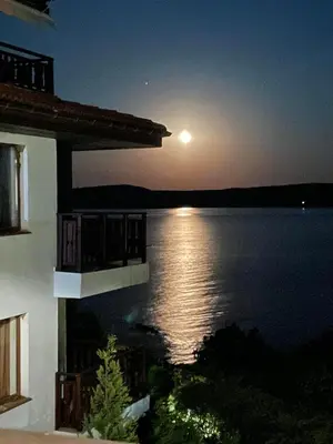 a view of the sunset from a balcony of a house at Complex Gallery Saint Thomas in Sozopol