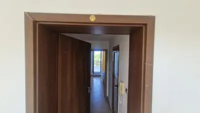 an open door with a sign on top of a hallway at One bedroom studio in Chernomorets