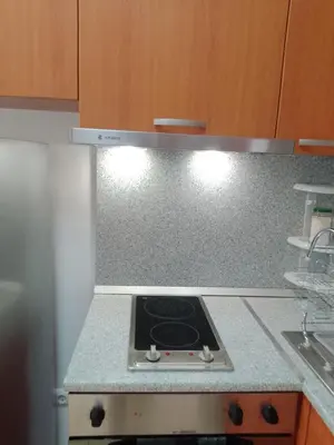 a kitchen with a stove and a counter top at 3 room apartment Sanny Day 2 in Sunny Beach