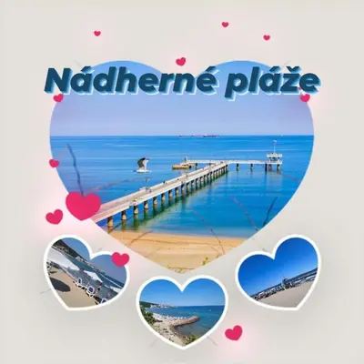 a picture of a beach and a pier with hearts at Grand rezort Marína Beach in Sveti Vlas