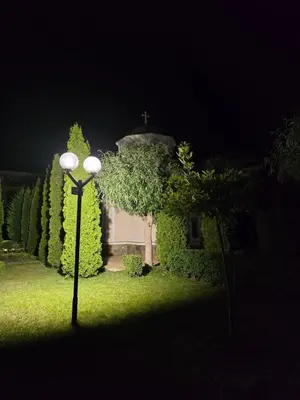 a street light in front of a house at night at Orchid Fort Garden in Sunny Beach