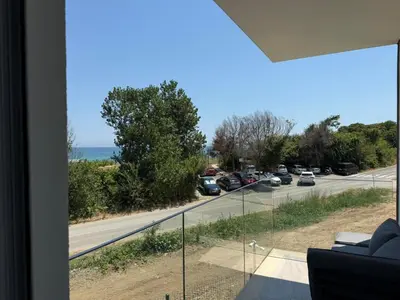 a view of a road with cars on the road at Aurum Villas Smokinya Beach 2 in Sozopol