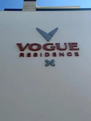 a sign for a vaporetto reissue on a building at Sea Home 8 in Sunny Beach