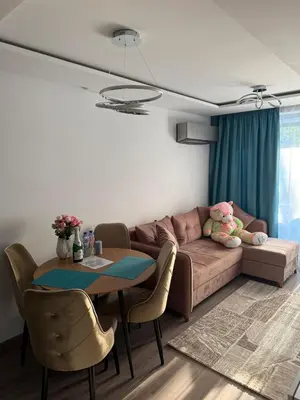 a living room with a couch and a table at Sea Home 9 in Sunny Beach
