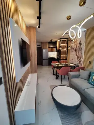 a living room with a couch and a table at Sunny Bay Sweet Homes Lux Apartment in Sunny Beach