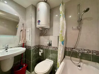 a bathroom with a shower and a toilet and a sink at Prime Location Studio Midia Beach in Sunny Beach
