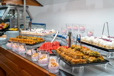 a buffet line with many different types of food at MPM Hotel Condor - All Inclusive Light in Sunny Beach