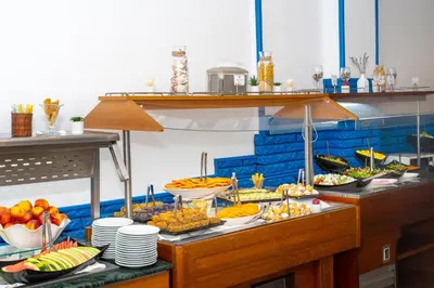 a buffet line with many different types of food at MPM Hotel Condor - All Inclusive Light in Sunny Beach