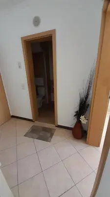 an empty room with a toilet and a tile floor at 2 Room Apartment Royal Sun E24 with Poolview and big Balcony in Sunny Beach