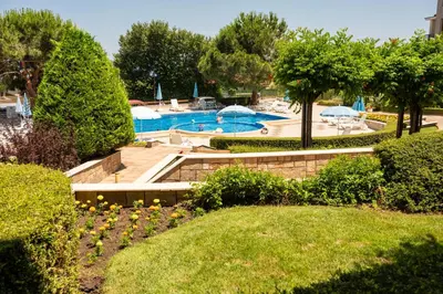 a view of a swimming pool in a resort at Paradise View Guest Apartment in Sozopol