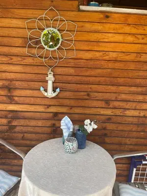 a table in a room with a tableablish at Family Paradise in Laguna Beach Hotel in Sozopol