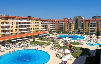 a resort with two swimming pools and a beach at Royal Sun - Vaio - 1BR Apt with Balcony - Pool View in Sunny Beach