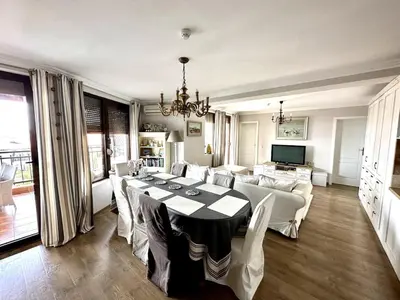 a large living room with a table and a couch at Luxury 3-BR apartment & sky terrace in Sveti Vlas