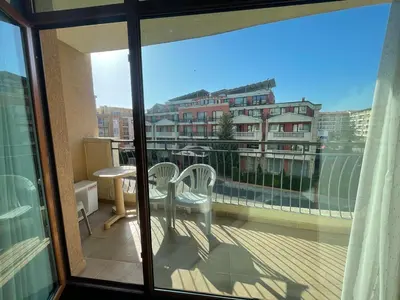 a view of a balcony with a table and chairs at Sunshine2 in Sunny Beach