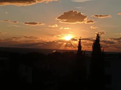 a sunset from the roof of a building at Studio Juli in Lozenets