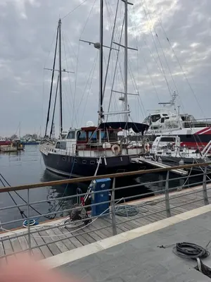 a group of boats are docked at a dock at Windmill Nessebar studio with sea view in Nesebar
