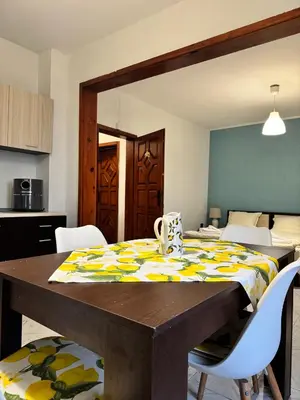 a dining room table with a table cloth on it at Vila Nikoleta in Sveti Vlas